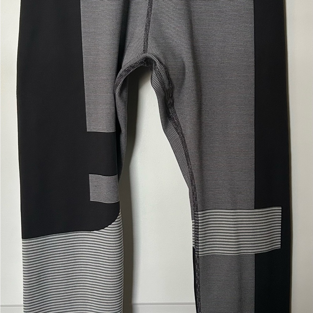 Nike Women’s Black and Gray Striped Panel Joggers